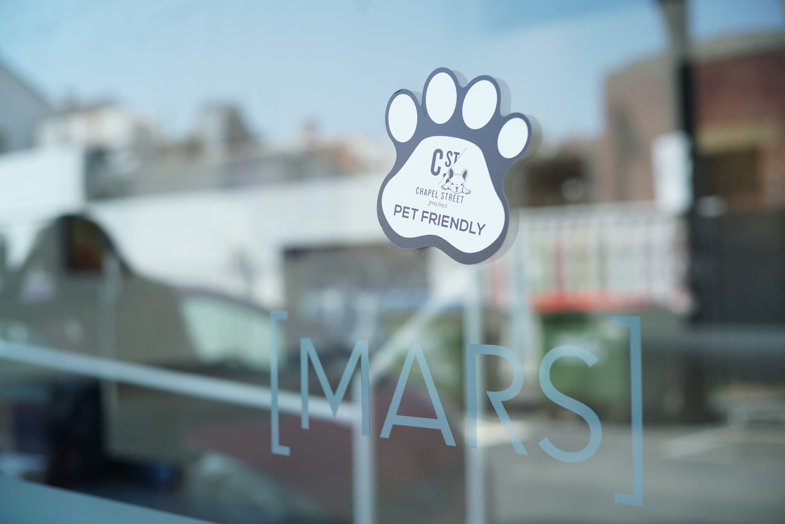 Pet-friendly. Paw print on window. MARS art gallery Melbourne.